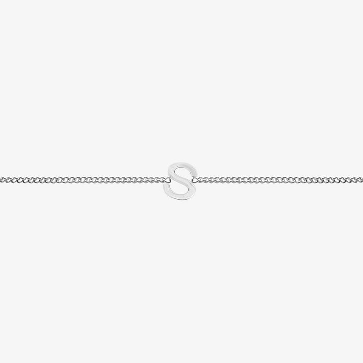 Maia Initial Bracelet with 'S' pendant on a delicate silver chain, perfect accessory for any occasion.