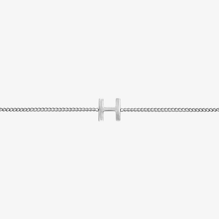 Maia Initial Bracelet featuring a delicate link chain and stunning 'H' initial pendant for stylish elegance.