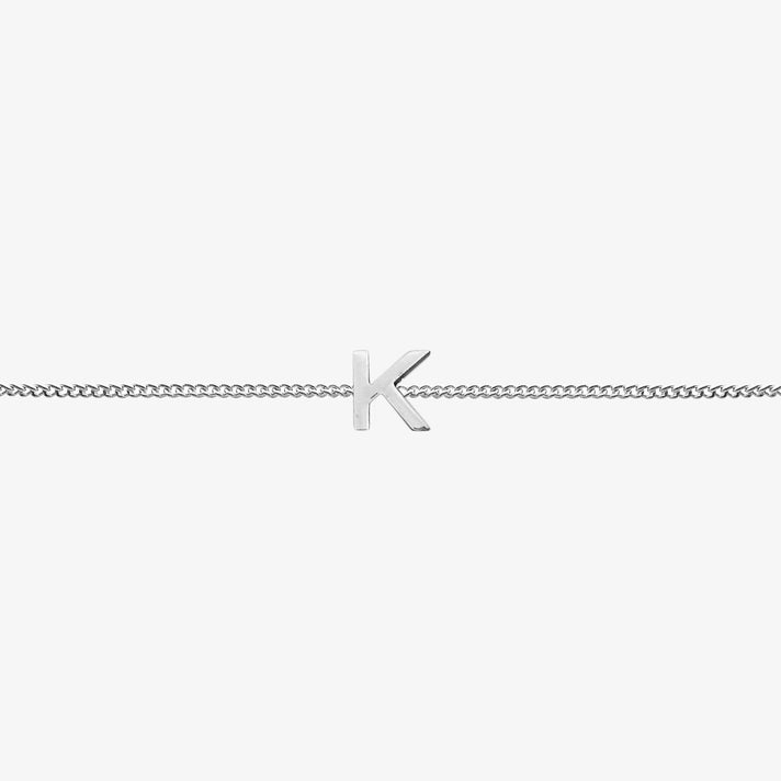 Maia Initial Bracelet featuring a delicate silver chain and a stunning 'K' initial pendant, perfect for any occasion.