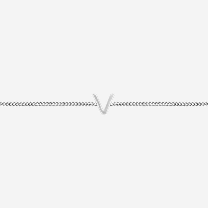 Maia Initial Bracelet with 'V' pendant on a delicate silver chain, perfect accessory for any occasion.