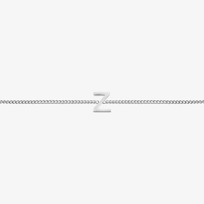  Maia Initial Bracelet with initial pendant on a delicate silver chain, perfect accessory for any occasion.