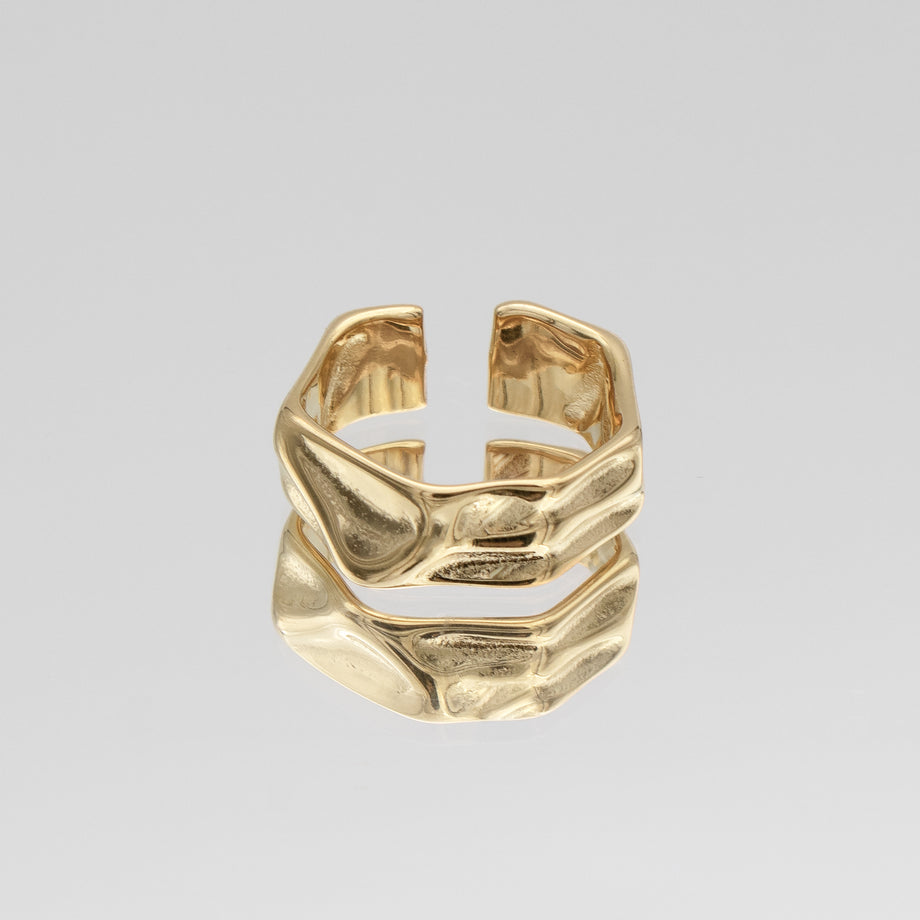 Malia Ring, featuring a molten design crafted in 18k gold plated stainless steel.