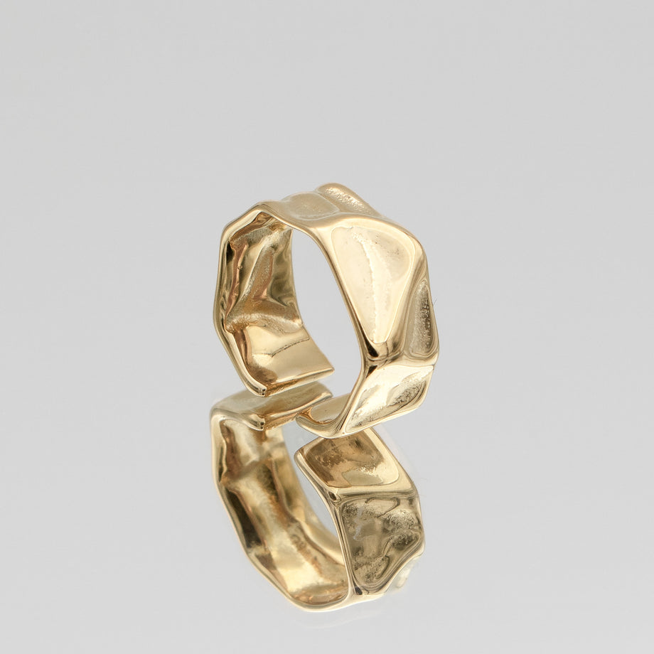 Malia Ring, featuring a molten design crafted in 18k gold plated stainless steel.