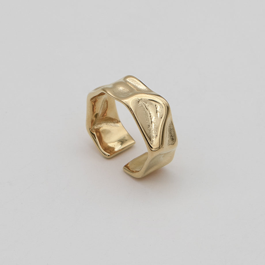 Malia Ring, featuring a molten design crafted in 18k gold plated stainless steel.