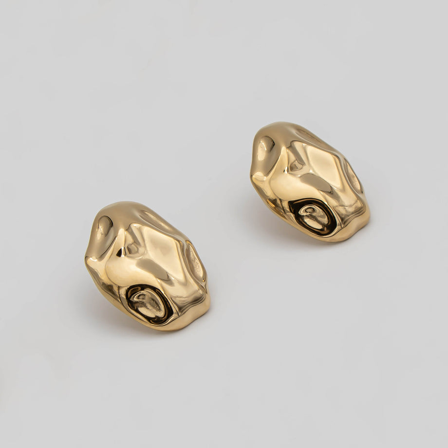 Versatile and retro style Marina Earrings in gold featuring a stud with a drop earring element from prya