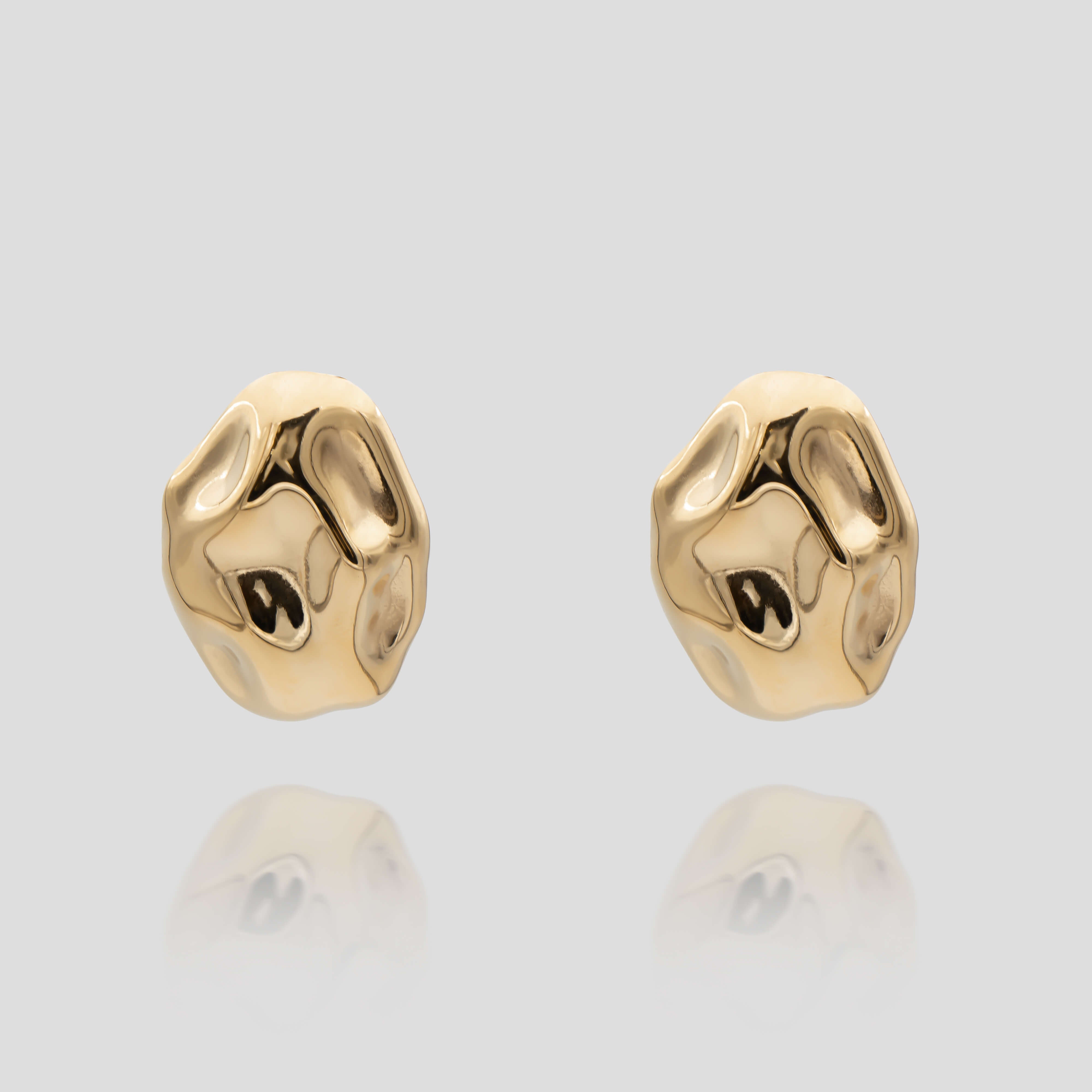 Versatile and retro style Marina Earrings in gold featuring a stud with a drop earring element from prya