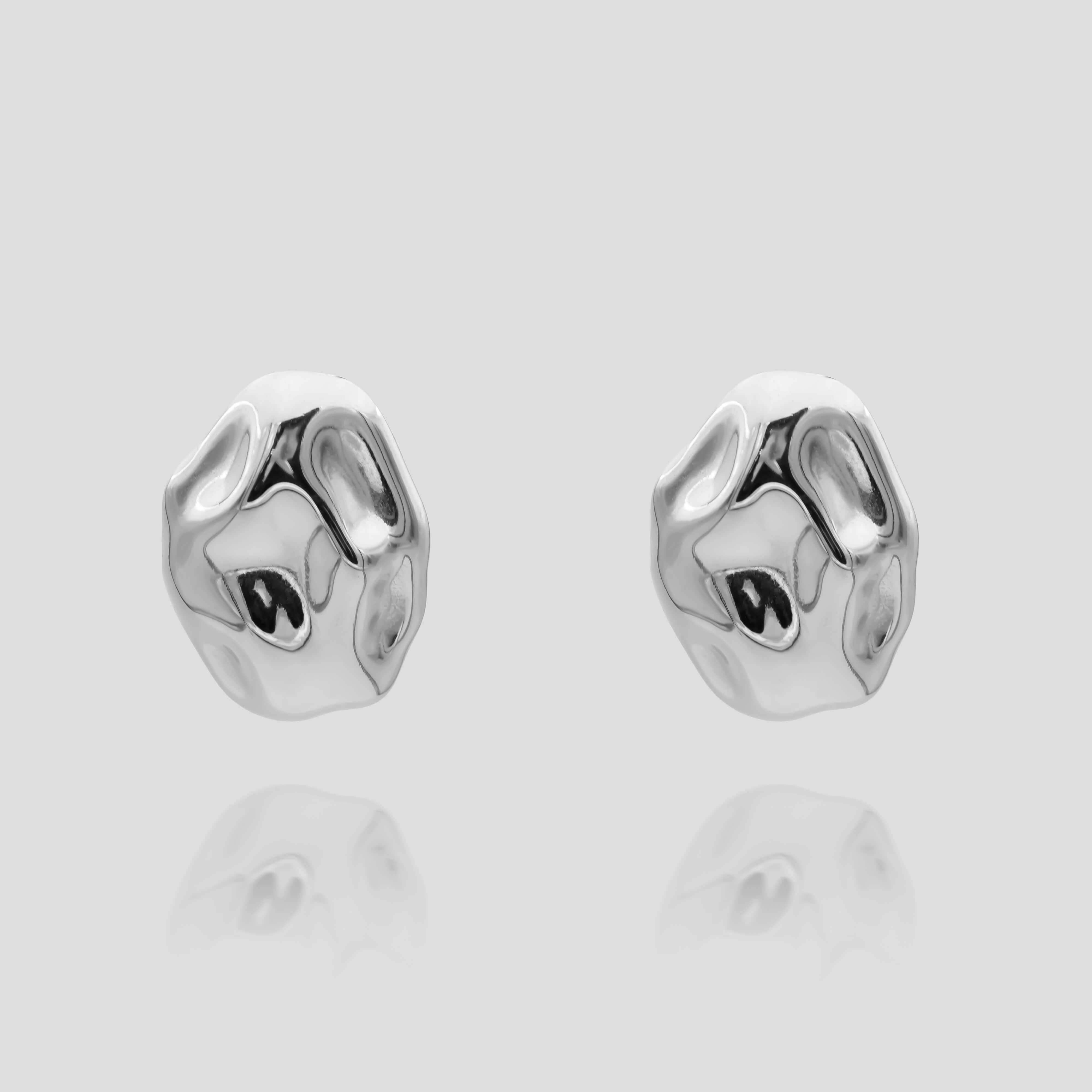 Versatile and retro style Marina Earrings in silver featuring a stud with a drop earring element from prya