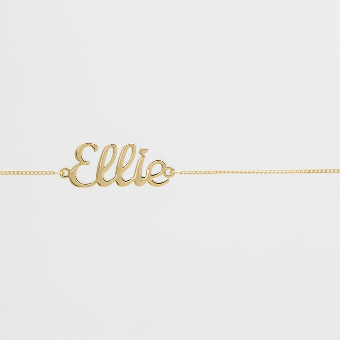 Gold chain with "Ellie" nameplate.