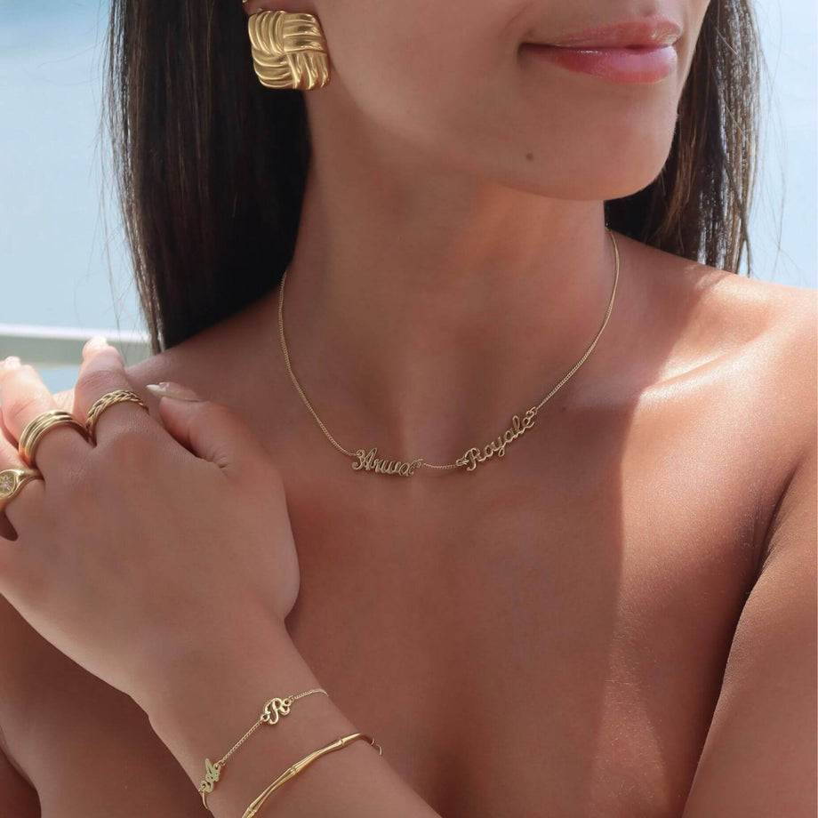 model wearing miami multiple name necklace in gold with two names from prya