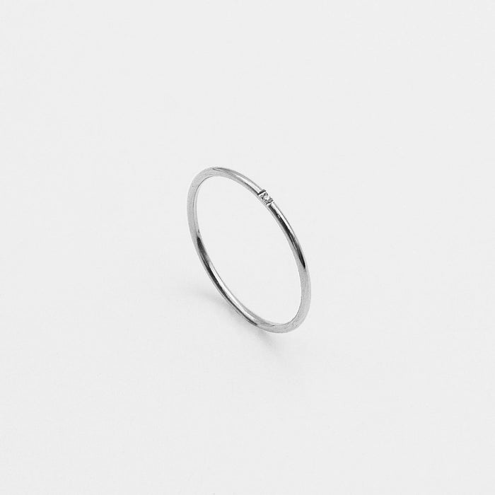 silver dainty ring with small diamond from prya