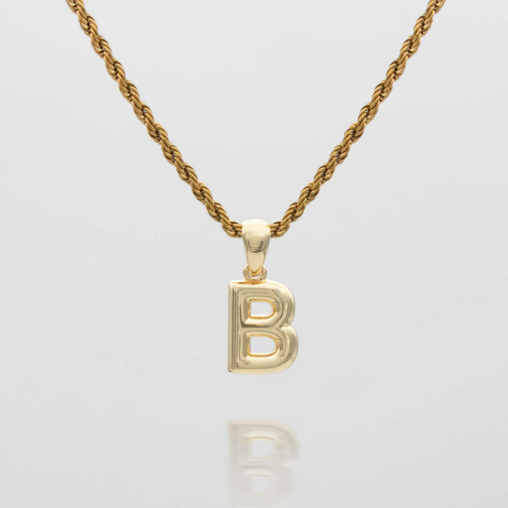 mini bubble initial necklace available in 18k gold or silver plated stainless steel from prya