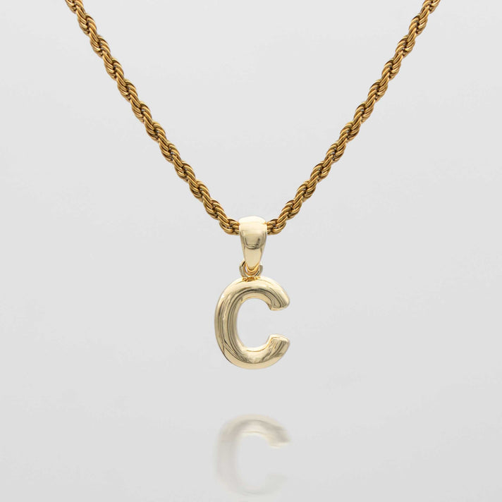 mini bubble initial necklace available in 18k gold or silver plated stainless steel from prya