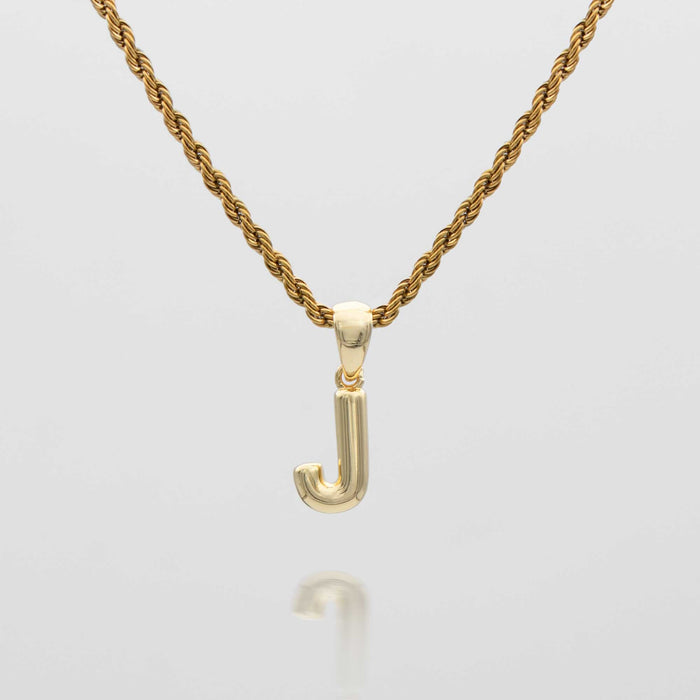 mini bubble initial necklace available in 18k gold or silver plated stainless steel from prya