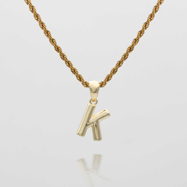 mini bubble initial necklace available in 18k gold or silver plated stainless steel from prya