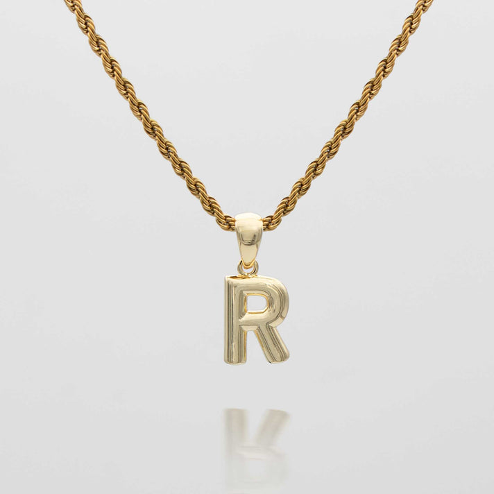 mini bubble initial necklace available in 18k gold or silver plated stainless steel from prya