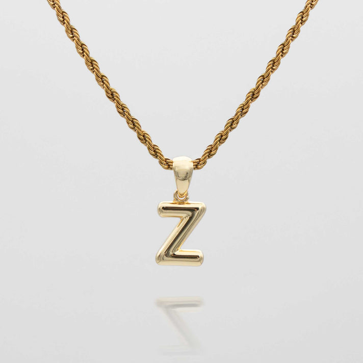 mini bubble initial necklace available in 18k gold or silver plated stainless steel from prya