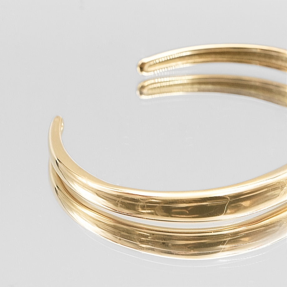 image of shiny gold bangle from prya 