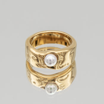 Nadine Pearl Ring, featuring a lustrous pearl set in a gold textured waved band from Prya