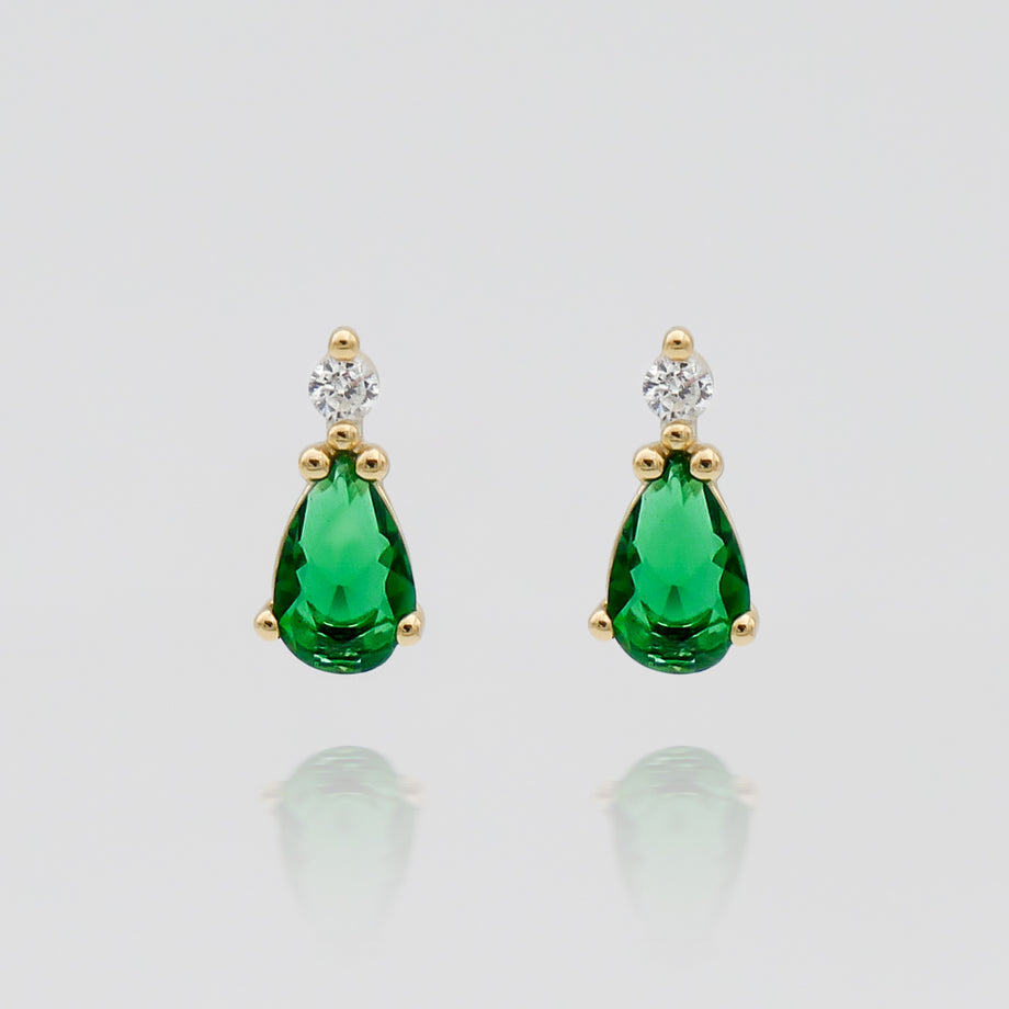 Emerald and diamond stud earrings.