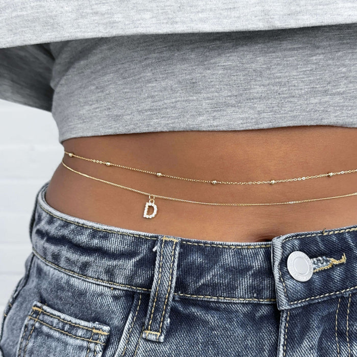 Samara ICY Initial Belly Chain featuring a customizable letter 'D' on a delicate mini curb chain.