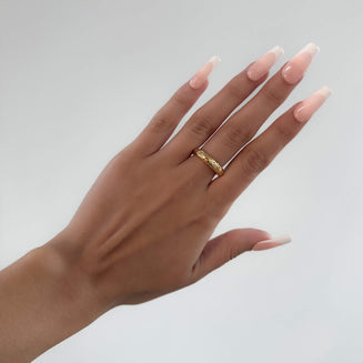 model wearing Astrid Ring, a Gold plated band with a unique sea urchin texture from prya