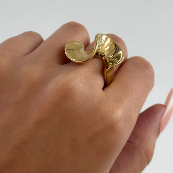 model wearing 18K plated gold abstract ring from prya