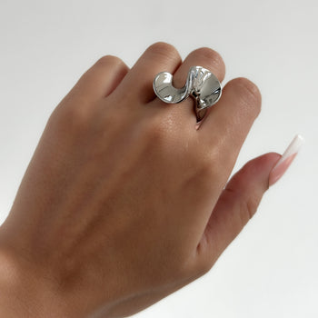 model wearing silver plated gold abstract ring from prya