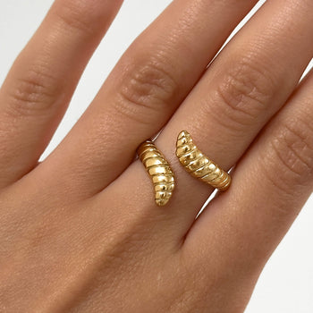 model wearing Meera Serpentine Gold plated ring with an elegant snake design with intricate grooves made by Prya