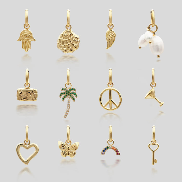 image of a selection of gold charms from prya