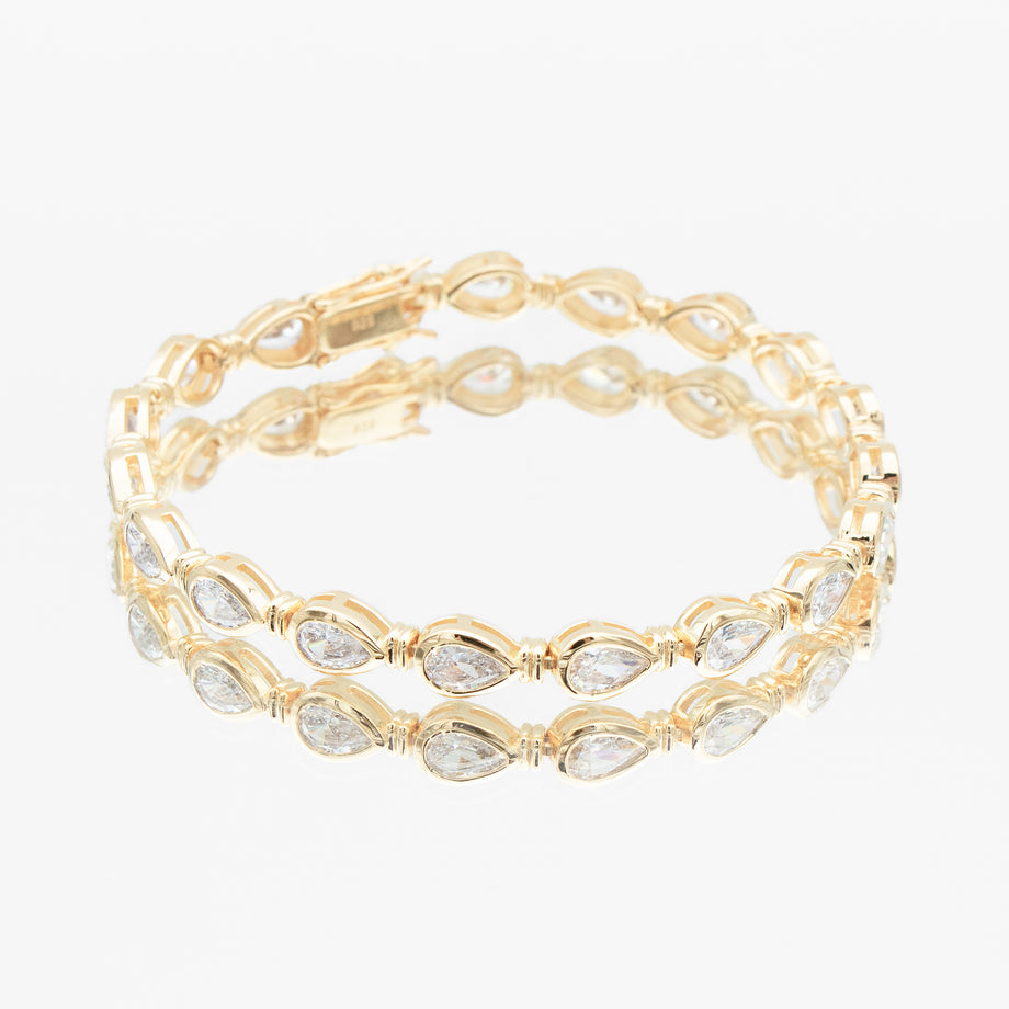 padel bracelet in 18k gold vermeil with Oval stones and pavé padel racket charm.