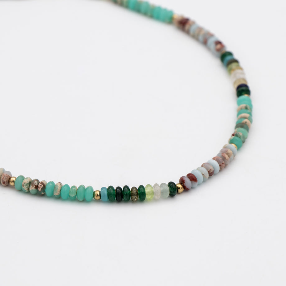  Ren Natural Stone Beaded Necklace, in earthy or water tones, accented by lustrous gold plated beads. 