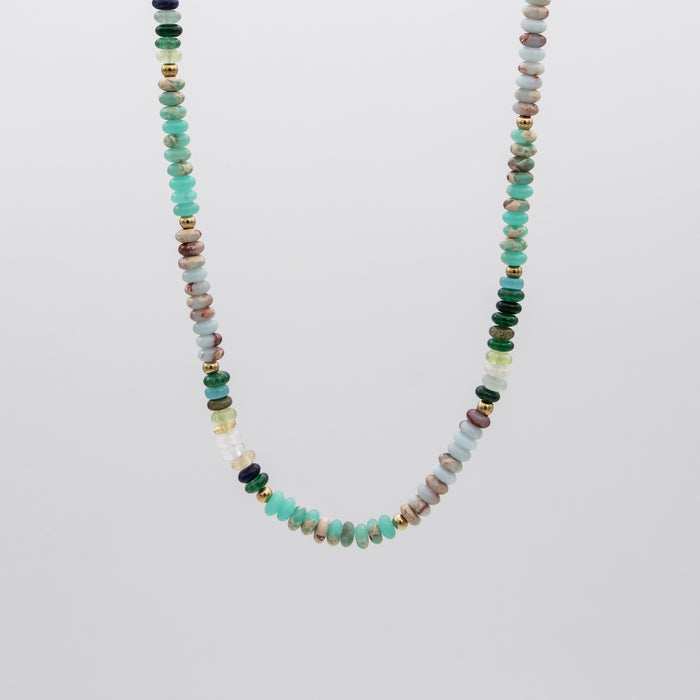  Ren Natural Stone Beaded Necklace, in earthy or water tones, accented by lustrous gold plated beads. 