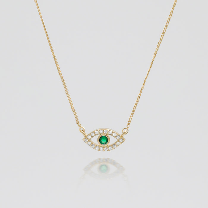 Gold Evil eye necklace paved with CZ and Emerald