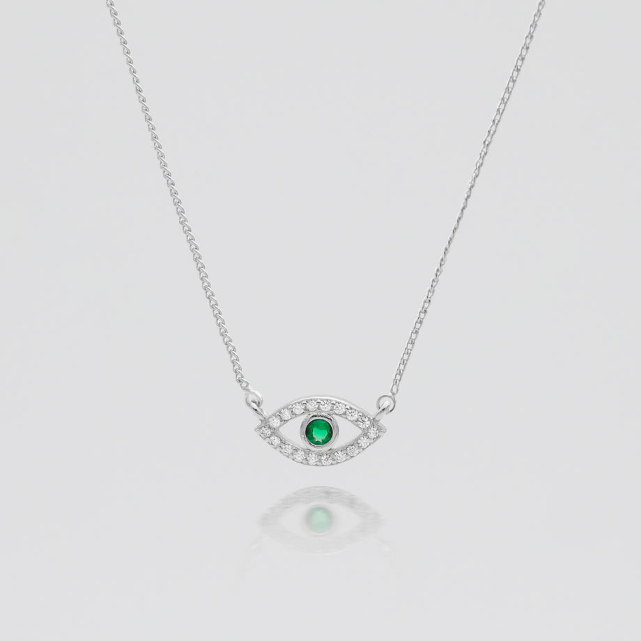 Silver Evil eye necklace paved with CZ and Emerald