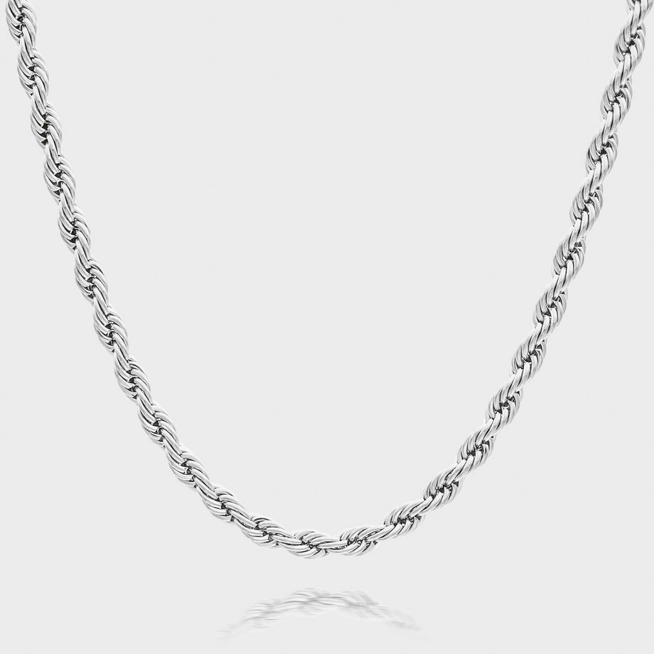 Silver rope chain necklace on white background.