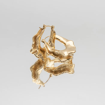 The Ruba 18k Gold plated medium Hoop Earrings, featuring an embossed design from prya