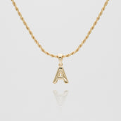 mini bubble initial necklace available in 18k gold or silver plated stainless steel from prya