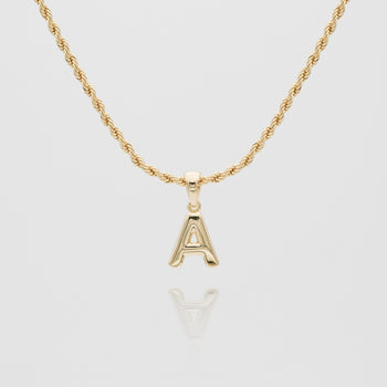 mini bubble initial necklace available in 18k gold or silver plated stainless steel from prya