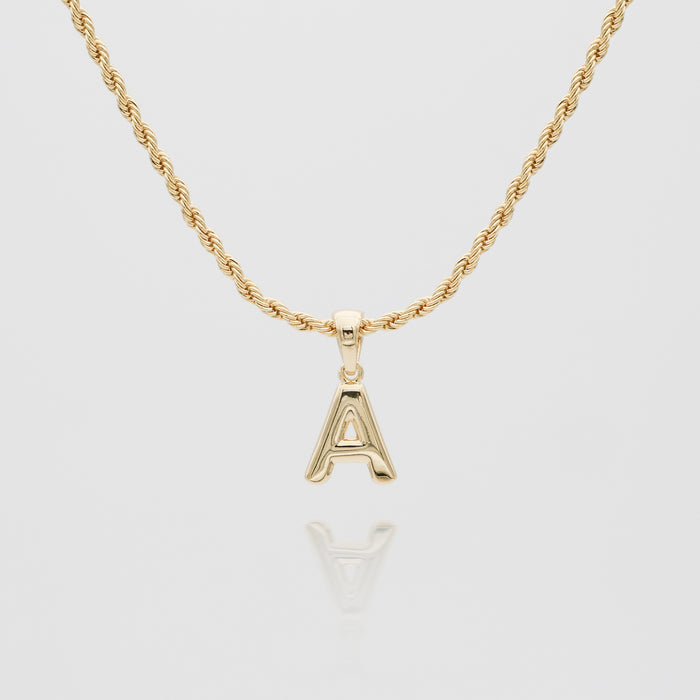 mini bubble initial necklace available in 18k gold or silver plated stainless steel from prya