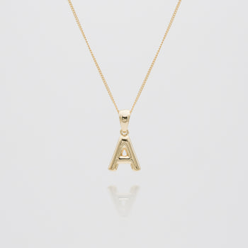 mini bubble initial necklace available in 18k gold or silver plated stainless steel from prya