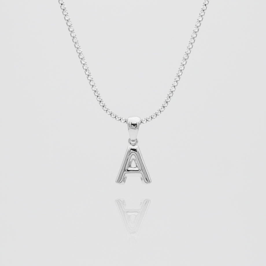 mini bubble initial necklace available in 18k gold or silver plated stainless steel from prya