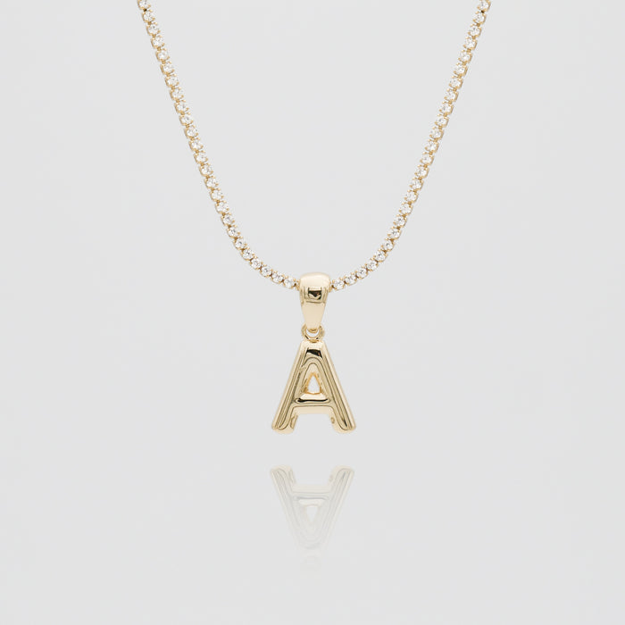 mini bubble initial necklace available in 18k gold or silver plated stainless steel from prya