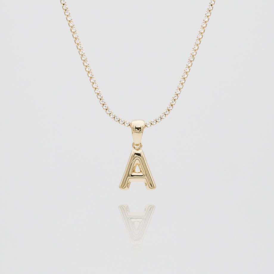 mini bubble initial necklace available in 18k gold or silver plated stainless steel from prya