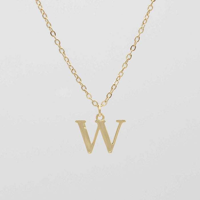 Gold plated initial necklace featuring the letter "W" on a delicate chain, perfect for personalization.