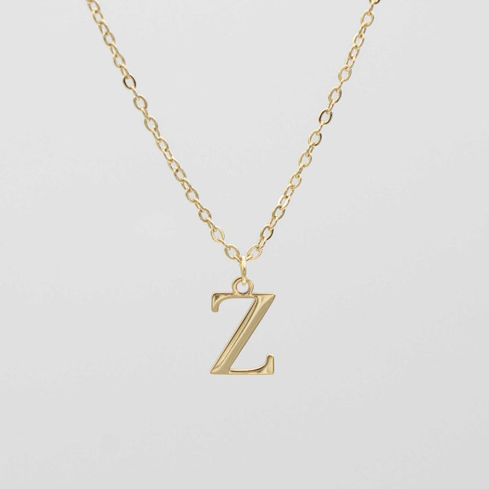 Gold plated initial necklace featuring the letter "Z" on a delicate chain, perfect for personalization.