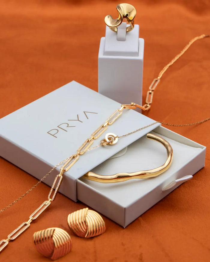 image of gold jewellery and gift box from prya