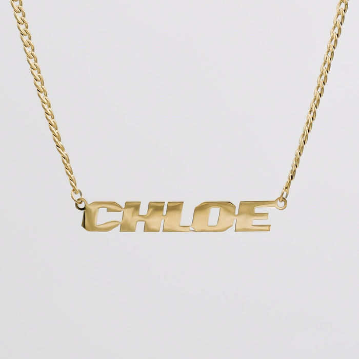 Gold chain necklace with "CHLOE" pendant.