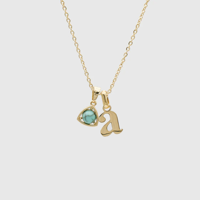 ecom shot of Kayla lower case initial and birthstone necklace in gold