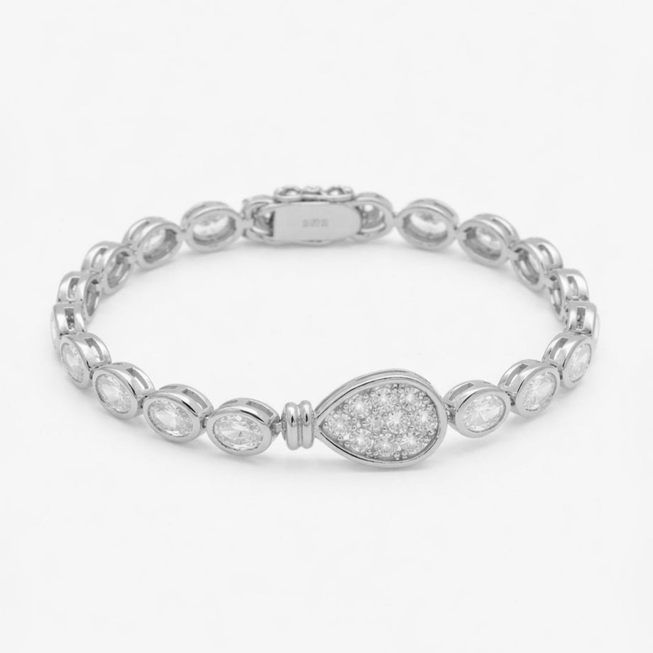 Bold, luxury padel bracelet in 925 sterling silver. Oval stones and pavé padel racket charm.