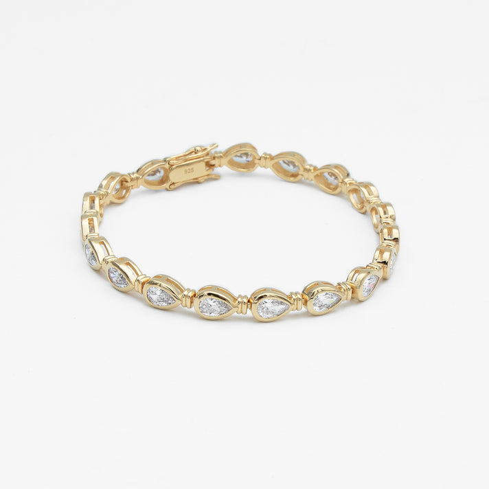 padel bracelet in 18k gold vermeil with Oval stones and pavé padel racket charm.